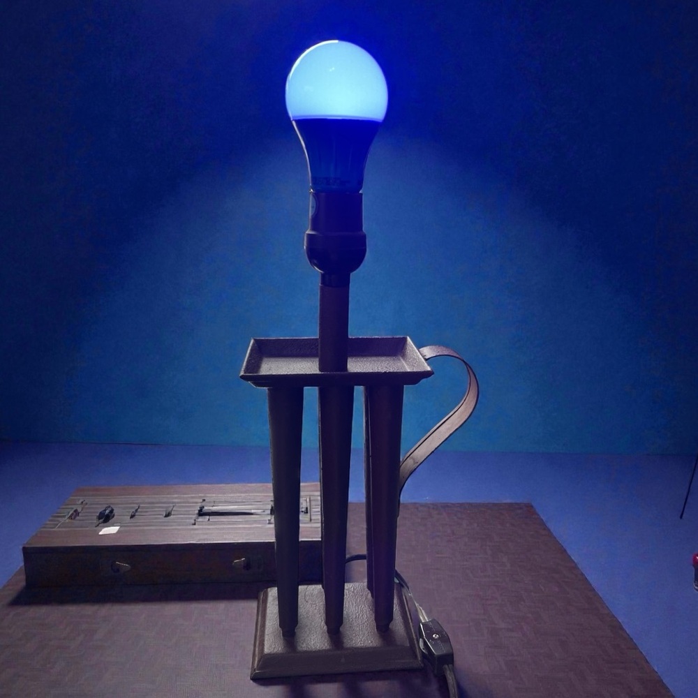 Primitive style table lamp meant to resemble a vintage candle mold, E26 base